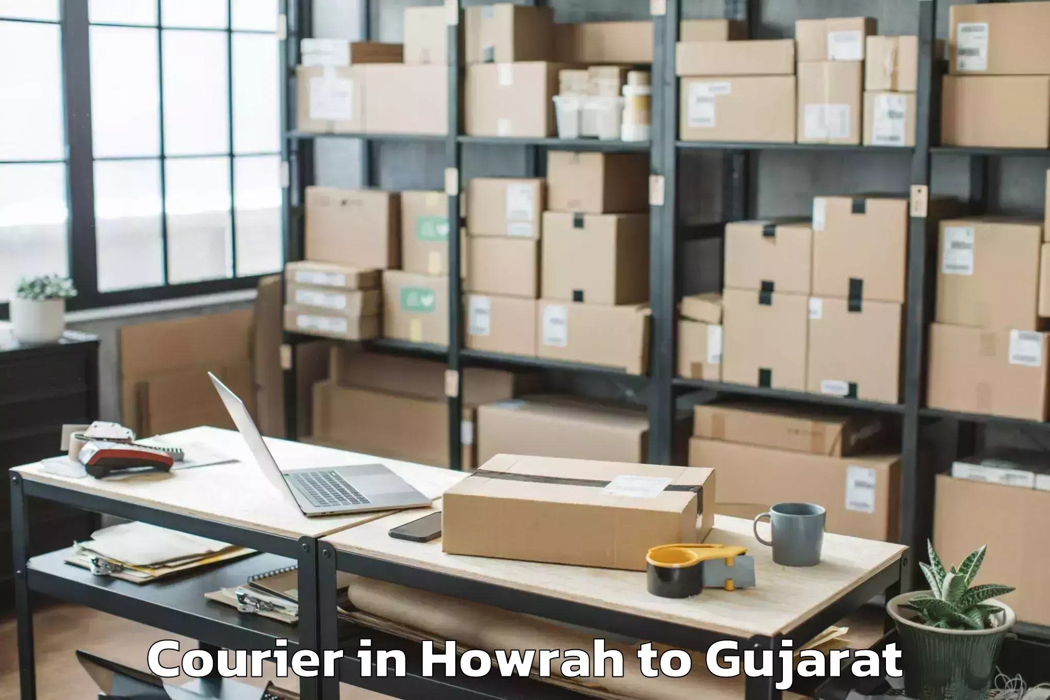 Reliable Howrah to Abrama Courier